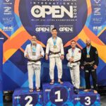 Coach Rich Kim with the Gold medal