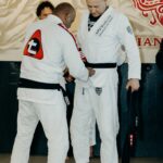 Professor Grant receiving his 4th degree black belt